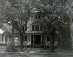 Three-Story House Partially Obscured by Trees, Tampa, Florida by George Skip Gandy IV