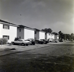 Apartment Complex with Cars Parked, B by George Skip Gandy IV