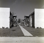 Sidewalk between Apartment Buildings by George Skip Gandy IV