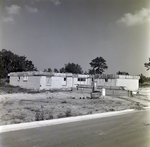 Cinderblock Building under Construction, A by George Skip Gandy IV