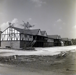 Half-timbered Apartment Building under Construction, A by George Skip Gandy IV