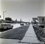 Sidewalk and Shops Along South Dale Mabry Highway, Tampa, Florida, A by George Skip Gandy IV