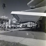 Damaged Awning with Onlookers on Davis Boulevard, Tampa, Florida, A by George Skip Gandy IV