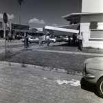 Damaged Awning with Onlookers on Davis Boulevard, Tampa, Florida, B by George Skip Gandy IV