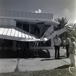 Damaged Awning with Onlookers on Davis Boulevard, Tampa, Florida, C by George Skip Gandy IV