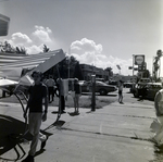 Damaged Awning with Onlookers on Davis Boulevard, Tampa, Florida, D by George Skip Gandy IV