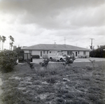 Residential Building with Truck Parked in Front, Tampa, Florida, A by George Skip Gandy IV