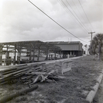 Boat Storage and Piles of Wood by Waterfront, Tampa, Florida, A by George Skip Gandy IV