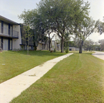 Sidewalk and Exterior of Brookgreen Apartments, Clearwater, Florida, B by George Skip Gandy IV