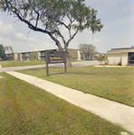 Entrance Sign and Residential Buildings at Brookgreen Apartments, Clearwater, Florida by George Skip Gandy IV