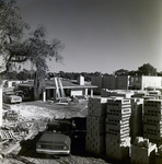 Stacked Concrete Blocks and Construction Equipment at Del Lago Apartments, Tampa, Florida, B by George Skip Gandy IV