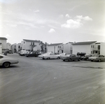 Parking Area with Multiple Cars at Del Lago Apartments, Tampa, Florida, B by George Skip Gandy IV