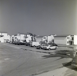 Cars in the Parking Lot of Del Lago Apartments, Tampa, Florida, A by George Skip Gandy IV