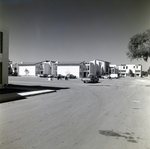 Parking Area with Cars at Del Lago Apartments, Tampa, Florida, B by George Skip Gandy IV