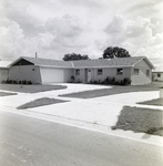 Residential House with Garage and Driveway in Del Rio Estates, Tampa, Florida, B by George Skip Gandy IV