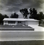 Brick Residential House with Garage in Del Rio Estates, Tampa, Florida, A by George Skip Gandy IV