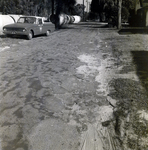 Roughly Paved Street with Parked Truck and Concrete Pipes, Winter Park, Florida by George Skip Gandy IV