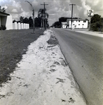 Roadside View with Sandy Path and 7-Eleven Store, Winter Park, Florida by George Skip Gandy IV