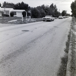 Cars Driving on a Residential Street, Tampa, Florida by George Skip Gandy IV