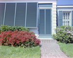 Entrance of Home with Landscaping by George Skip Gandy IV