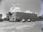 Commercial Building with Cars in Parking Lot, B by George Skip Gandy IV