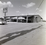 View of Bill Currie Ford Truck Dealership, Tampa, Florida, C by George Skip Gandy IV