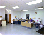 Office Interior with Employees Working by George Skip Gandy IV