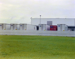 Facility with Semi Trucks by George Skip Gandy IV