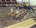 Workers Using Power Tools on Timber, E by George Skip Gandy IV