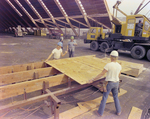 Workers Using Power Tools on Timber, J by George Skip Gandy IV