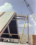 Workers Using a Crane for a Timber Beam, J by George Skip Gandy IV