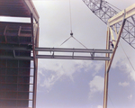 Workers Using a Crane for a Timber Beam, K by George Skip Gandy IV