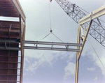 Workers Using a Crane for a Timber Beam, S by George Skip Gandy IV