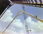 Workers Using a Crane for a Timber Beam, T by George Skip Gandy IV