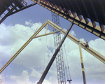 Workers Using a Crane for a Timber Beam, V by George Skip Gandy IV