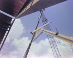 Workers Using a Crane for a Timber Beam, W by George Skip Gandy IV