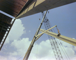 Workers Using a Crane for a Timber Beam, X by George Skip Gandy IV