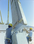 Workers Using a Crane for a Timber Beam, AD by George Skip Gandy IV