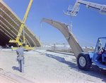 Workers Using a Crane and a Rope for a Timber Beam, C by George Skip Gandy IV