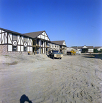 English Village Apartments Under Construction, A by George Skip Gandy IV