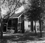 Brick House with Large Windows Surrounded by Trees, A by George Skip Gandy IV