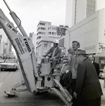 Man on Excavator in front of First Federal Downtown Tampa by George Skip Gandy IV