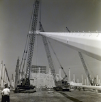 Floodlight Lifted by Crane during Field Construction, Florida Steel, G by George Skip Gandy IV