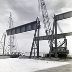 Florida Steel Crane Carrying Steel Beam over Water at Westinghouse Electric, F by George Skip Gandy IV
