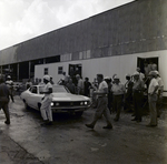 Florida Steel Crew Admires Car Outside, A by George Skip Gandy IV