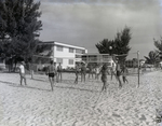 Volleyball Game on Beach with Resort Buildings, Madeira Beach by George Skip Gandy IV