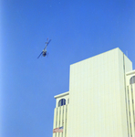 Helicopter Flying by Exchange National Bank in Tampa by George Skip Gandy IV