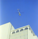 Helicopter Flying by Exchange National Bank in Tampa by George Skip Gandy IV