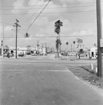 Commercial Intersection with Super Test Station, A by George Skip Gandy IV