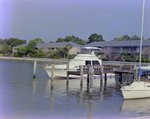 Boats Docked at M&M Management Property, A by George Skip Gandy IV